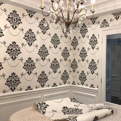 اجرای کاغذ دیواری و نقاشی ساختمان عوض‌پور
